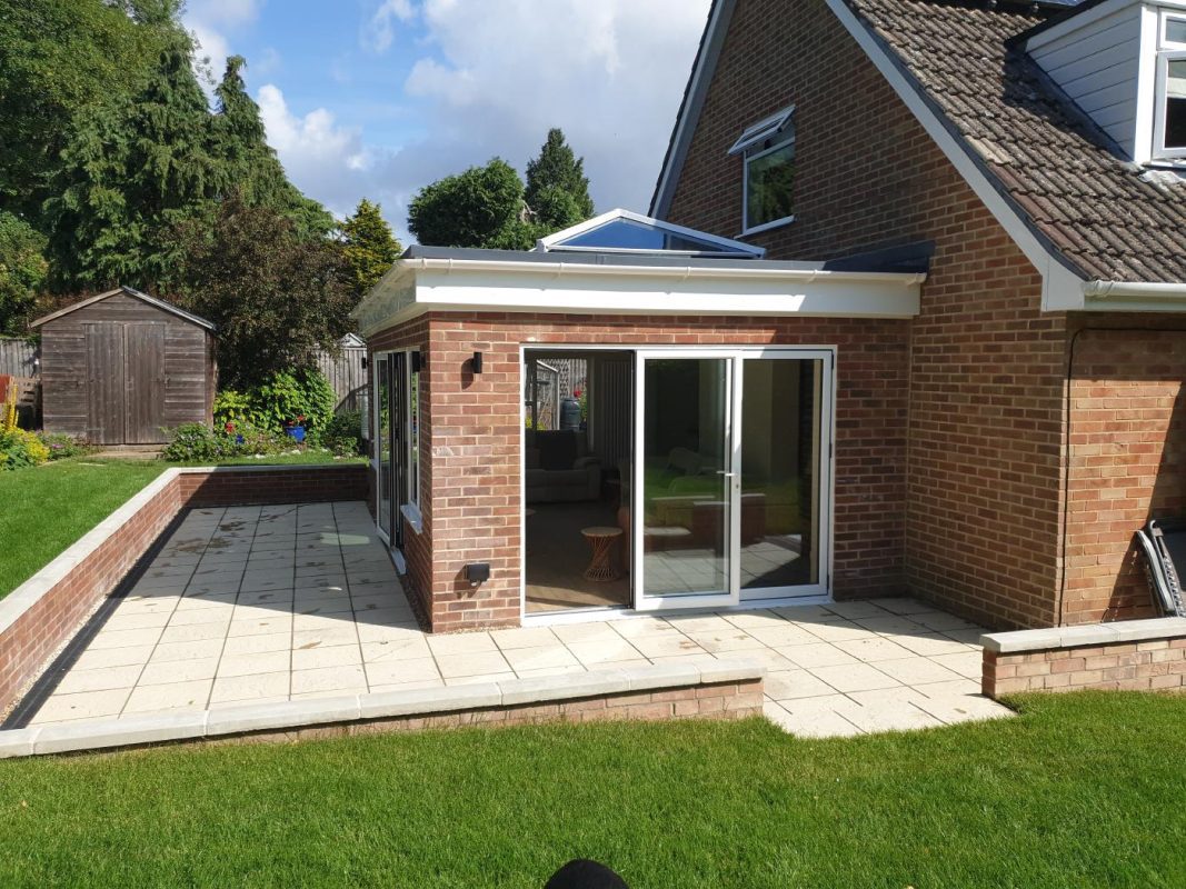 Traditional Fascia Orangery With Patio Installation