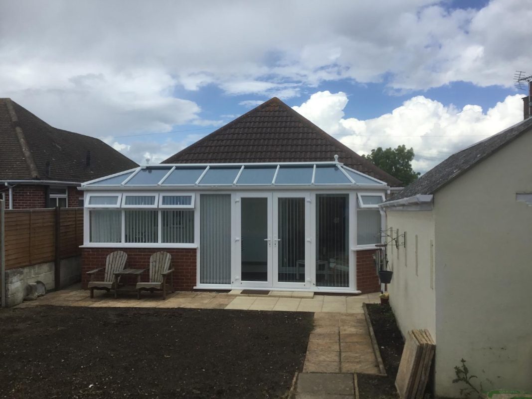 PVC Double Hipped Conservatory With French Patio Doors