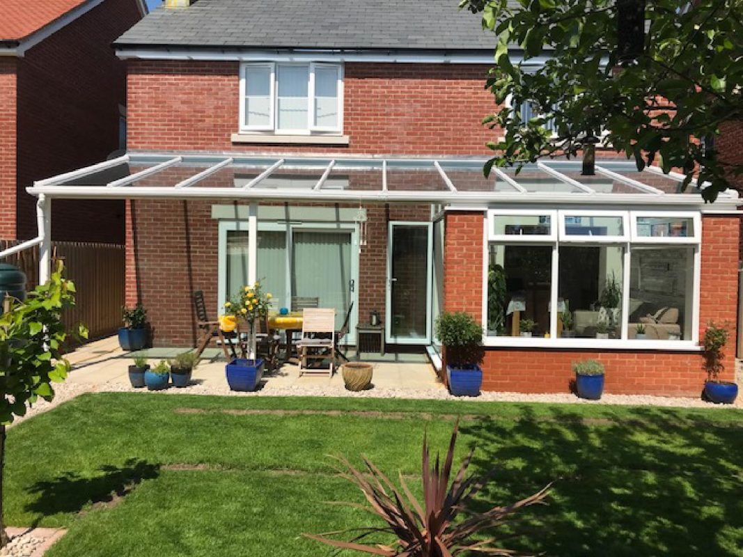 Lean-to Conservatory with Glazed Awning.