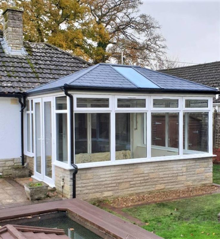 Replacement Conservatory With Solid Roof System and New Pvc Windows and French Doors